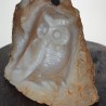Owl sculpture on rough agate