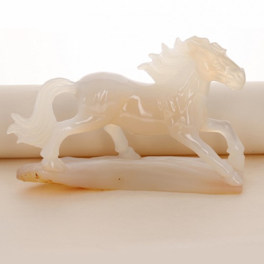 Sculpture horse carved on an agate base