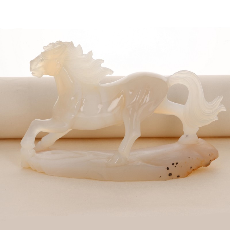 Sculpture horse carved on an agate base