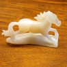 Sculpture horse carved on an agate base