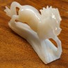 Sculpture horse carved on an agate base