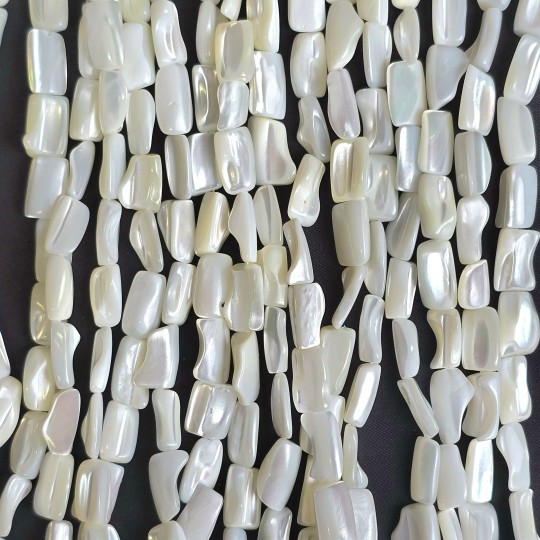 Strand of white mother-of-pearl fancy shape Ø 8/10 mm