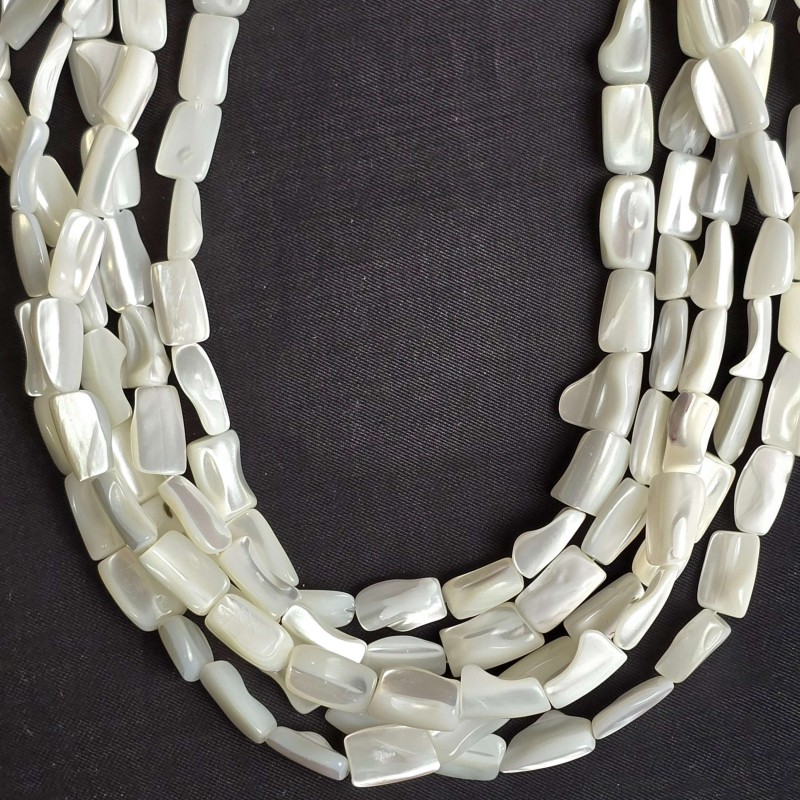 Strand of white mother-of-pearl fancy shape Ø 8/10 mm