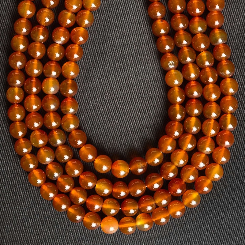 Strand of agate orange natural spherical cut Polished Ø 10 / 10.5 mm