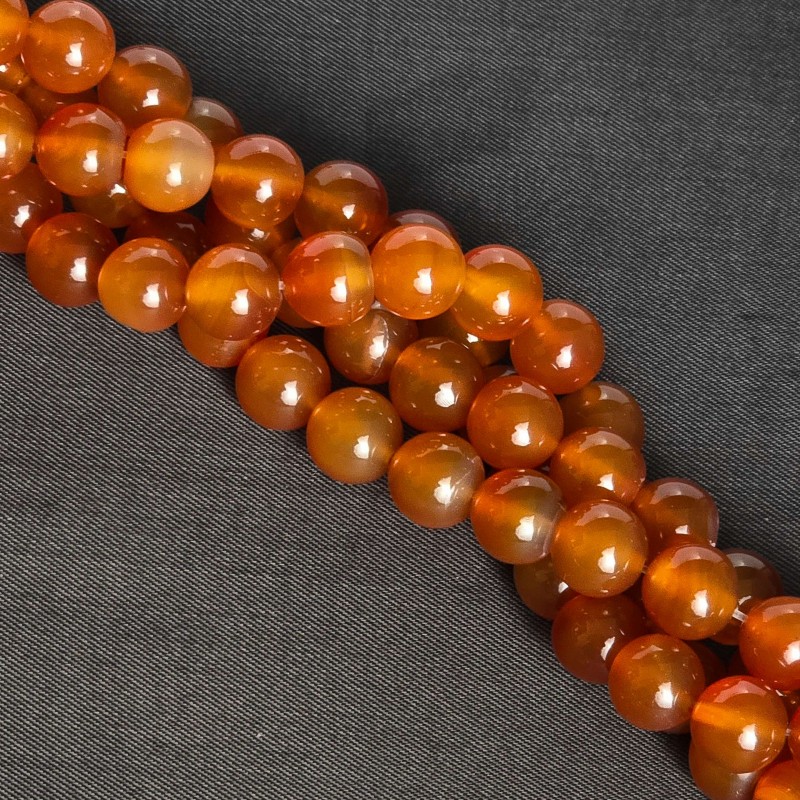 Strand of agate orange natural spherical cut Polished Ø 10 / 10.5 mm