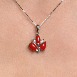 Fantasy triangle pendant with red coral