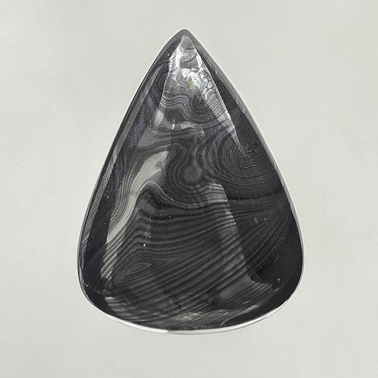 Pietra di Psilomelano a Goccia 62,51 Ct.