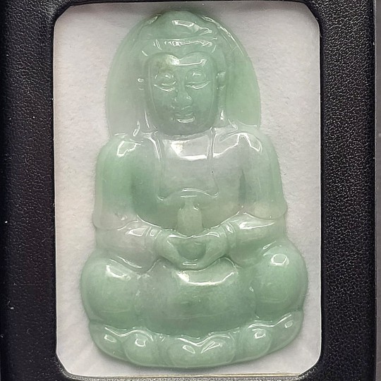 Sculpture with giada engravings with Buddha