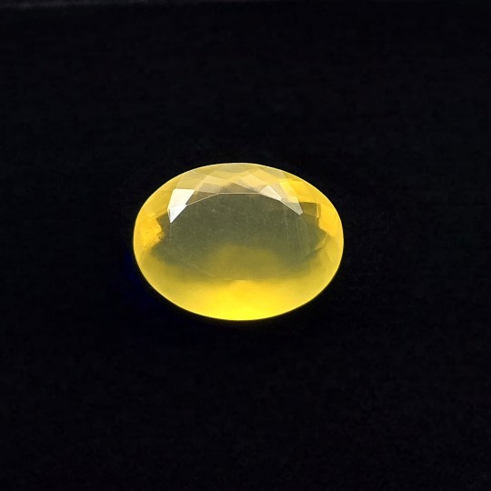 Gemstone of Opal Of Oval Yellow Fire 7.04 ct.