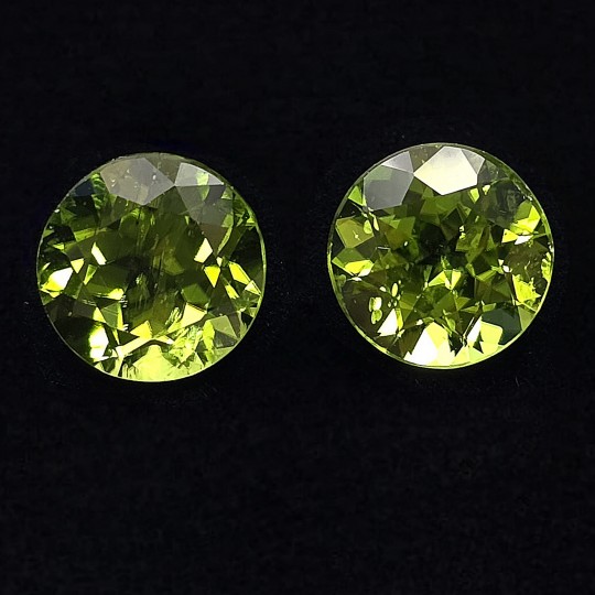 Pair Round peridot stones 15.26 ct.