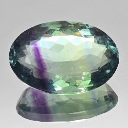 Pietra di Fluorite Verde con Bande Viola Ovale 32,06 Ct.